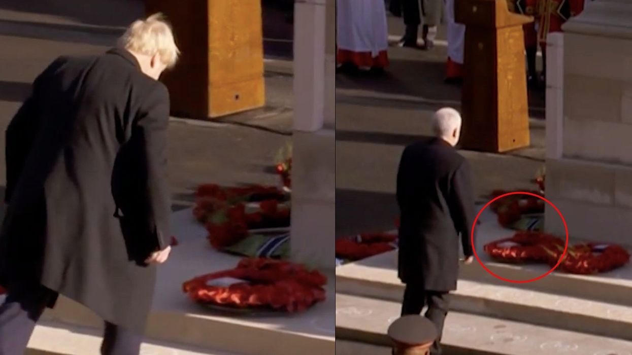 Boris Johnson lays his poppy wreath upside down during Remembrance Sunday service