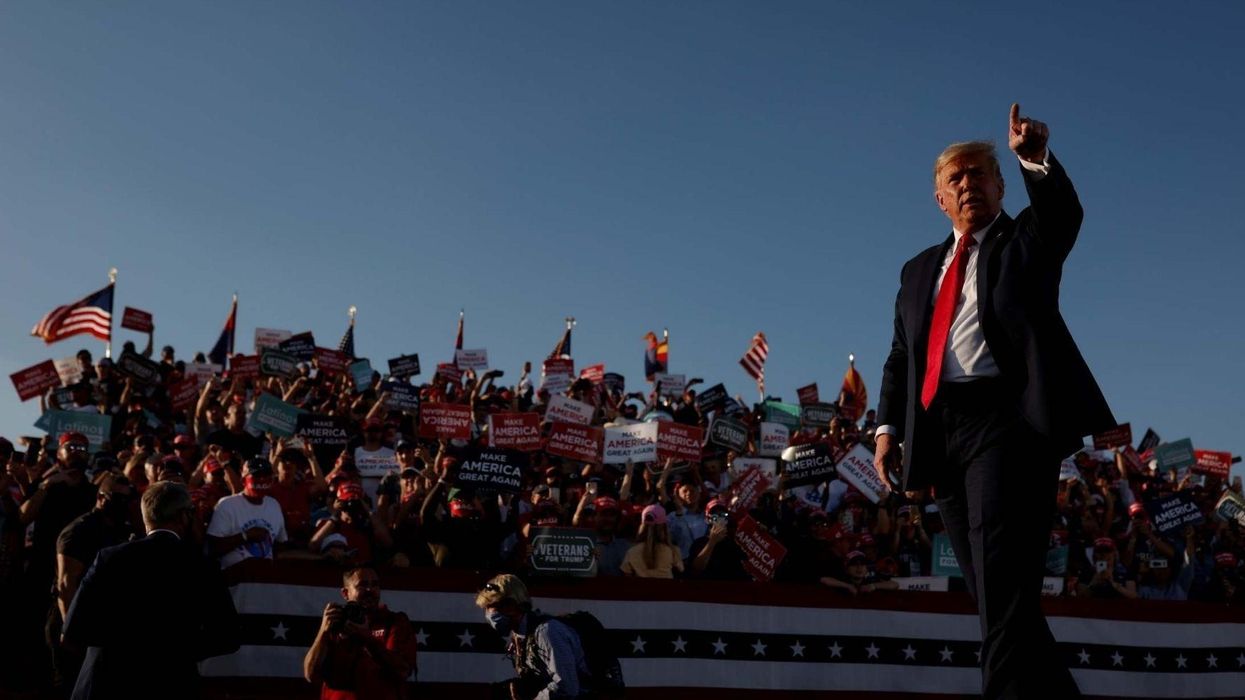 Bizarre footage shows Trump supporters fighting over MAGA hats as the Titanic theme music plays