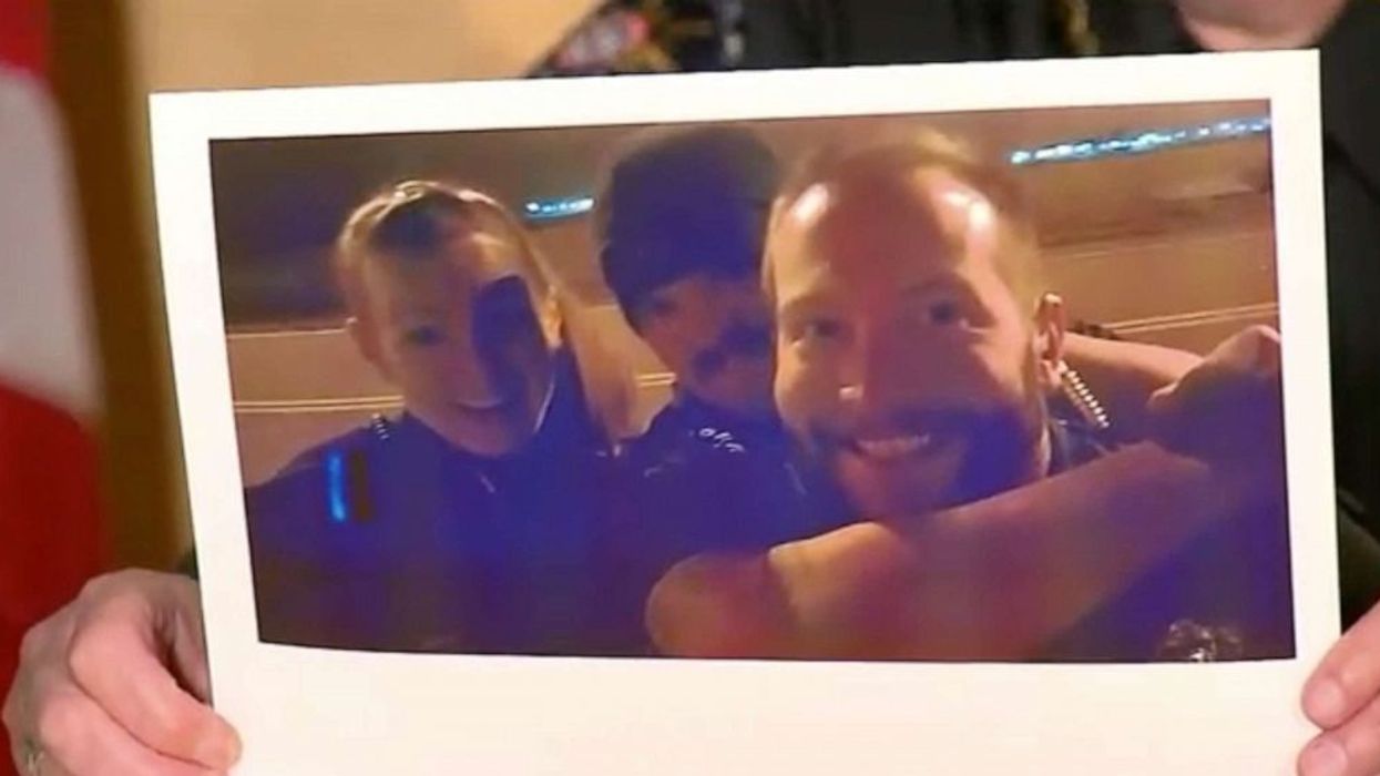Police officers fired for photos mocking Elijah McClain, a Black man who died after being choked by police