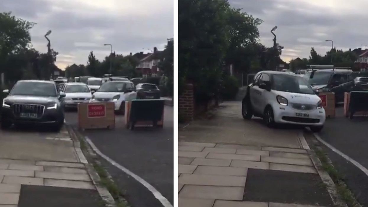 Shocking video shows rebellious drivers careering onto the pavement to avoid road blockade