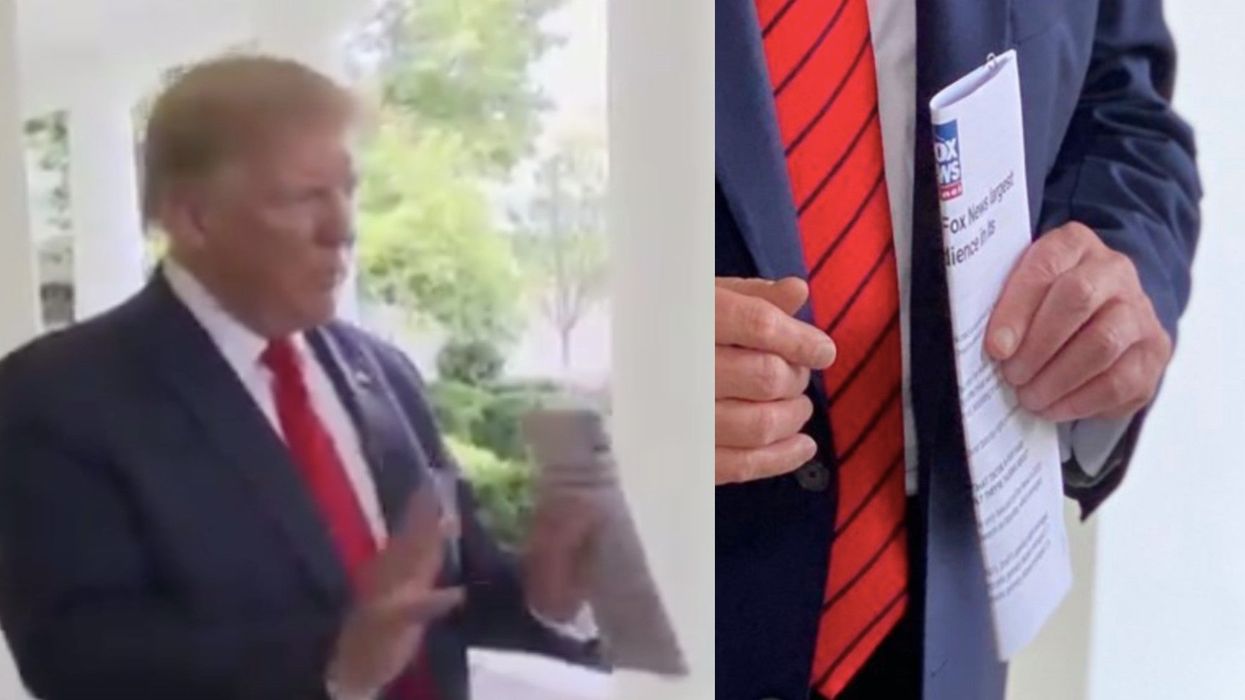 Trump spotted carrying a print out of an article praising the viewing figures of his disastrous Tulsa rally
