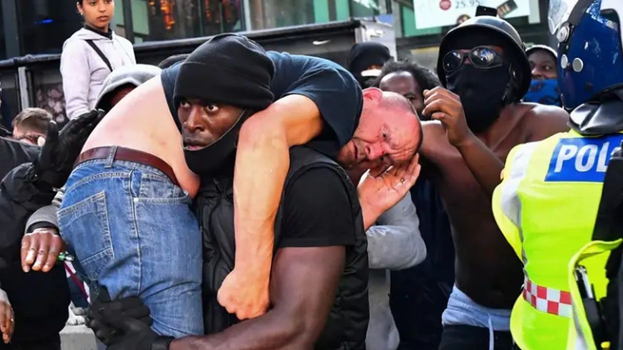 Black Lives Matter protester seen carrying injured ‘far-right’ protester to safety in London
