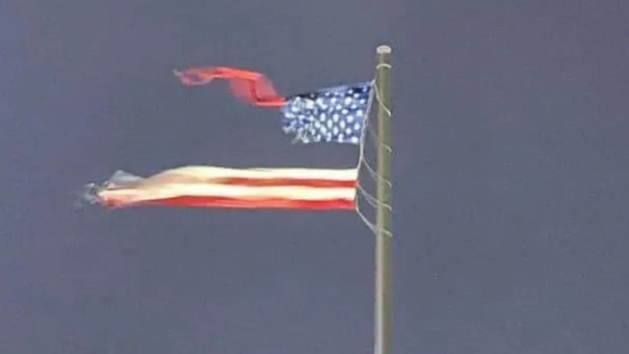 The world's largest American flag has been ripped into shreds by a thunderstorm