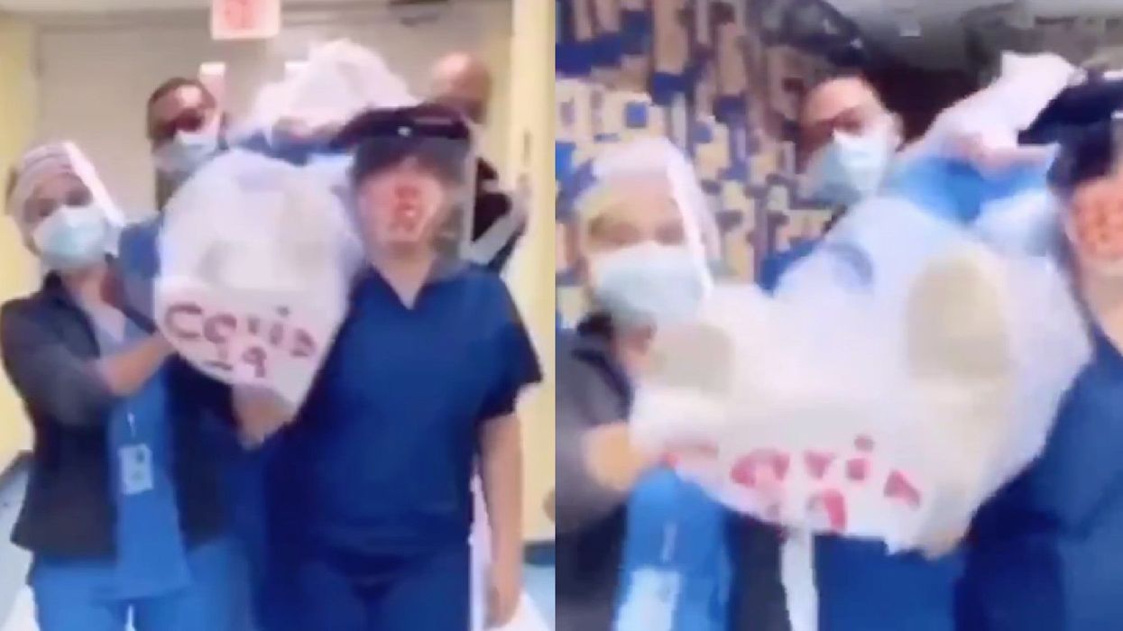 Huge backlash as nurses post shocking video appearing to dance with 'Covid-19 corpse'