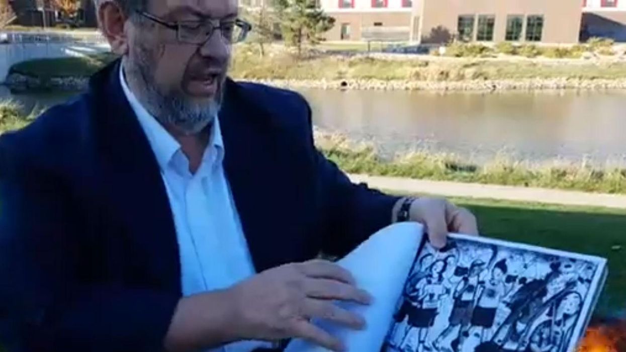 A man in Iowa has been charged after he burned four LGBT+ library books