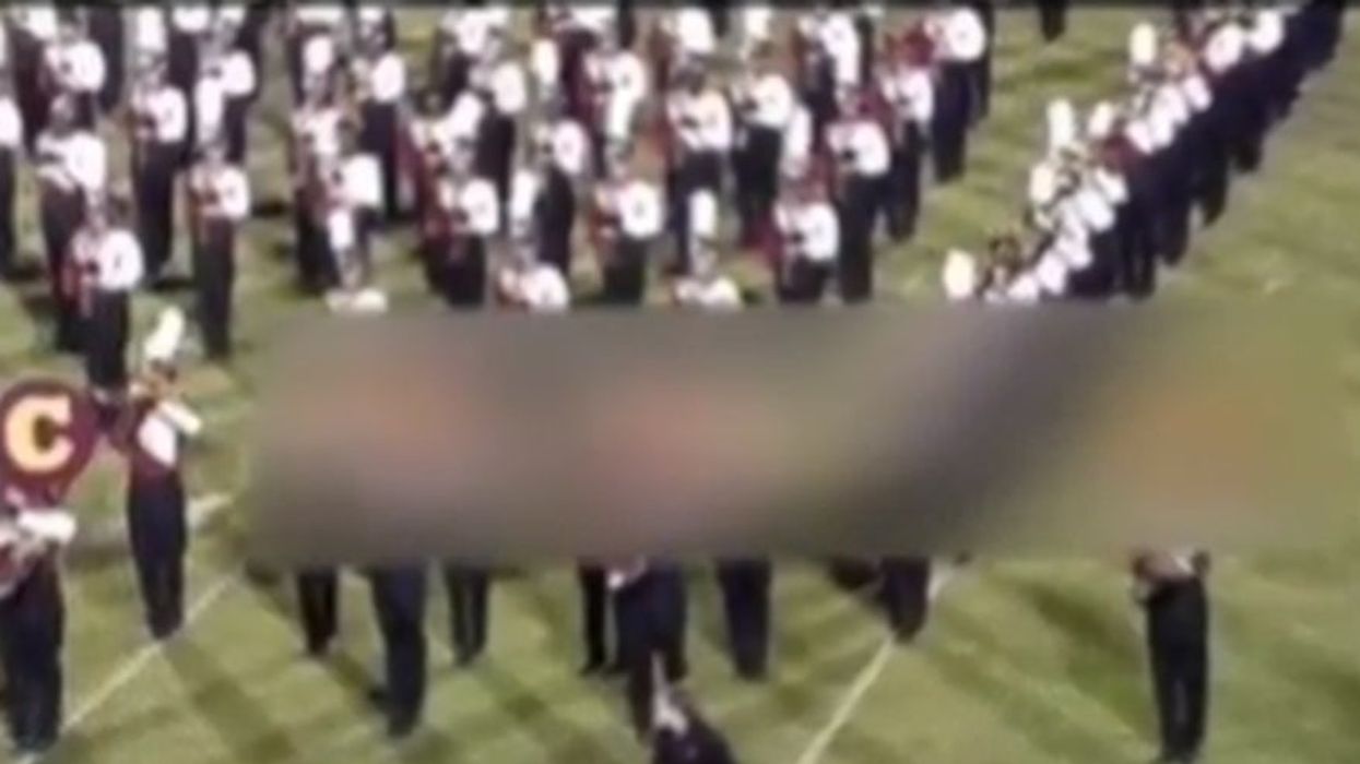 High school marching band spells out racial slur at football game