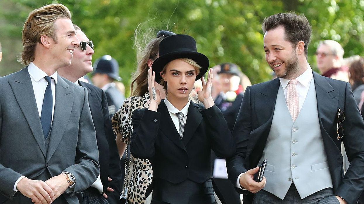 Cara Delevingne won the royal wedding by showing up in a power suit
