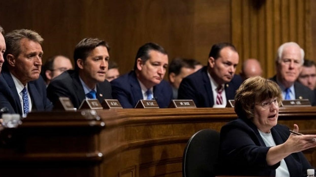 Photo of Republican men sat behind their female prosecutor sums up American gender politics