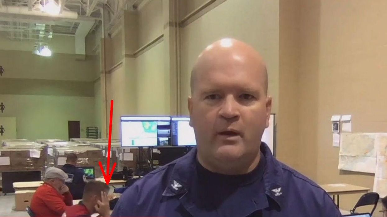 Coast guard member sneakily makes 'white power' sign live on TV
