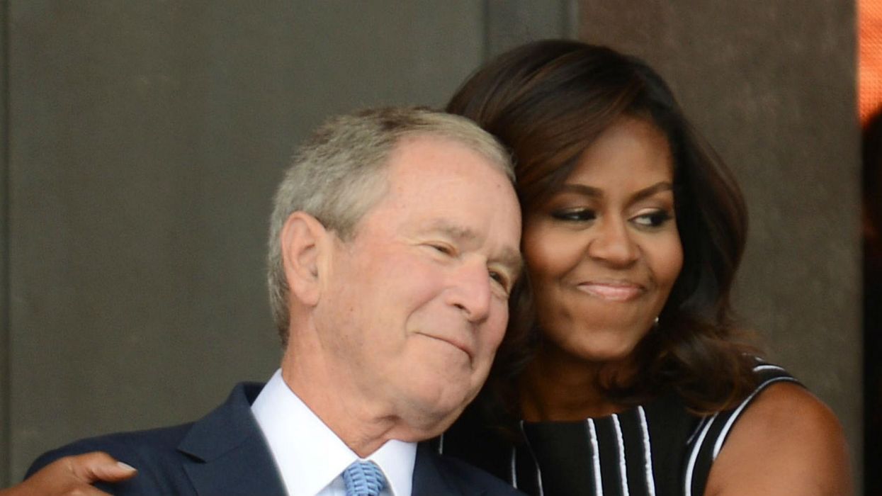 John McCain funeral: George W Bush slipping Michelle Obama candy during memorial will warm your heart
