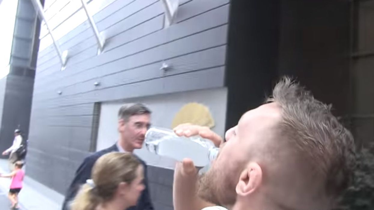 The bizarre moment Conor McGregor and Jacob Rees-Mogg pass each other on New York street