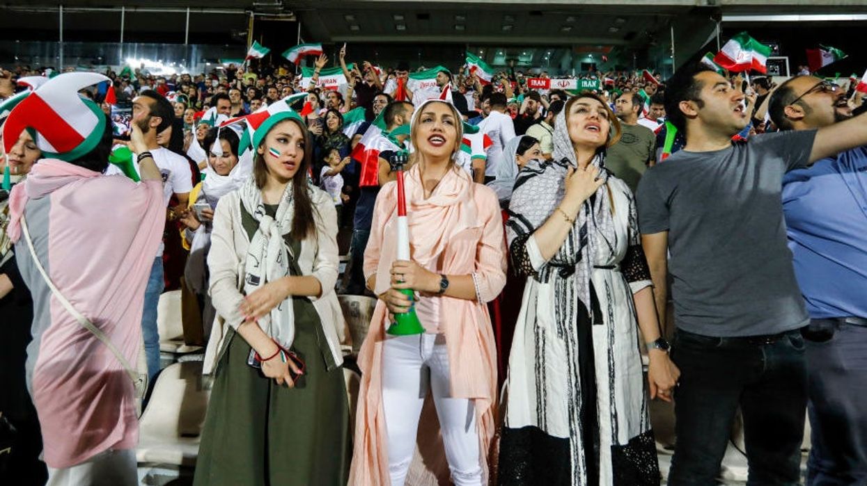 Women invited to watch football in Iranian stadiums for first time in 37 years