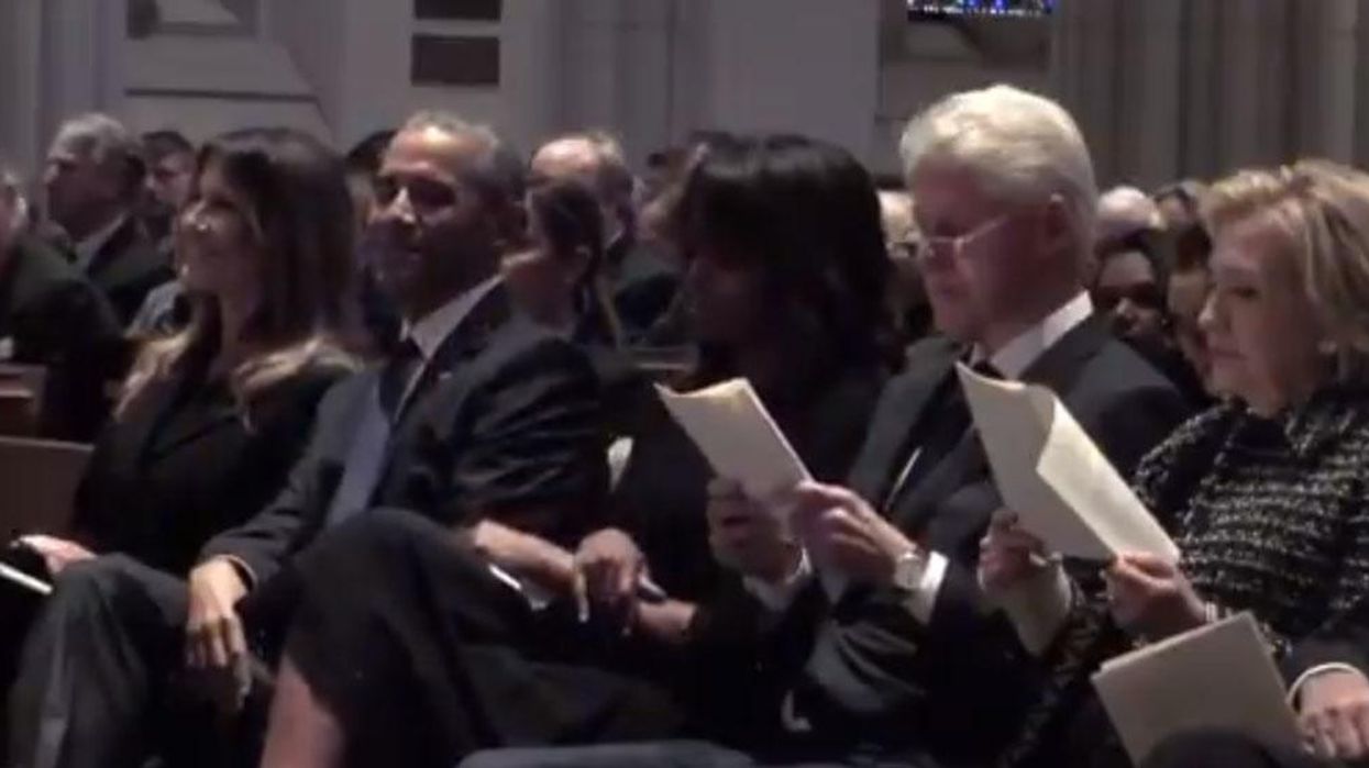 People are saying Melania looks happier at a funeral with Obama than she ever does with Trump