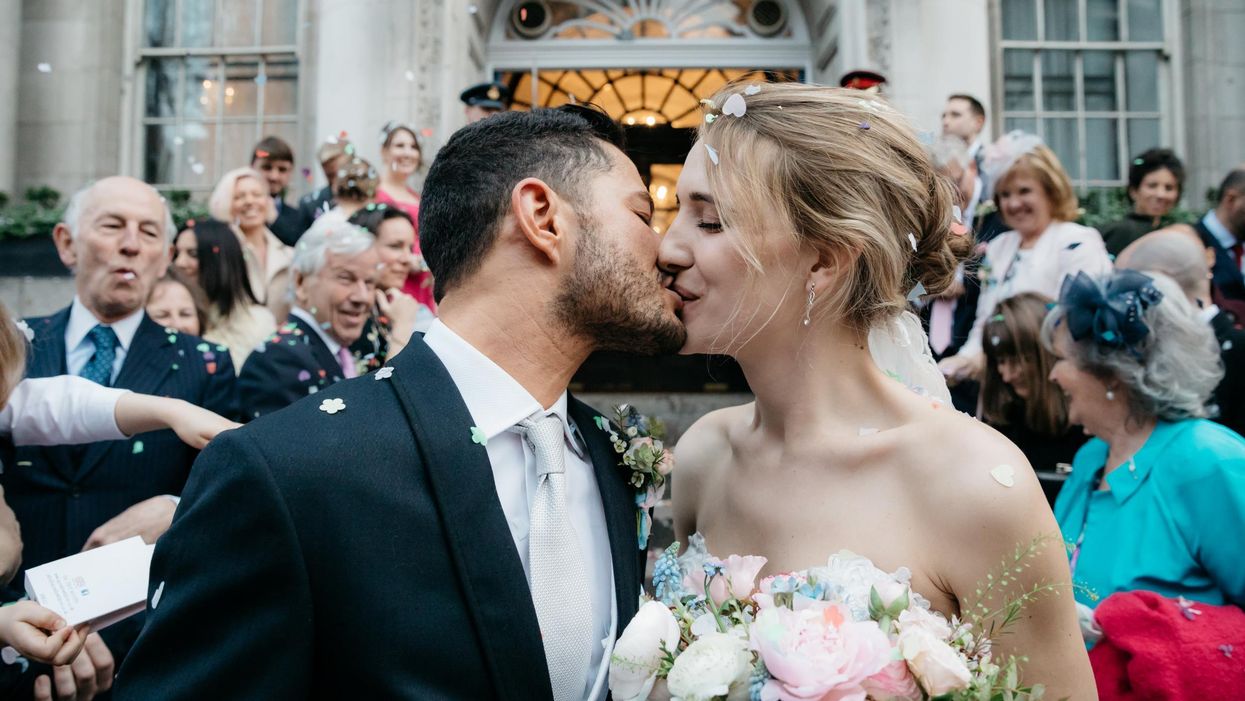 Trans couple whose wedding photos appeared on newspapers around the country talk trans visibility, pride and making peace with the press