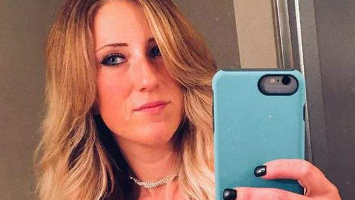 She disappeared from her driveway while her children were home. Police found her body in the woods.