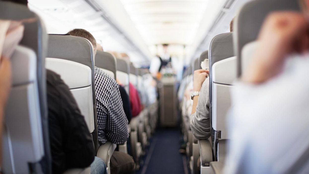 Passenger 'tries to strangle air steward on flight from hell'
