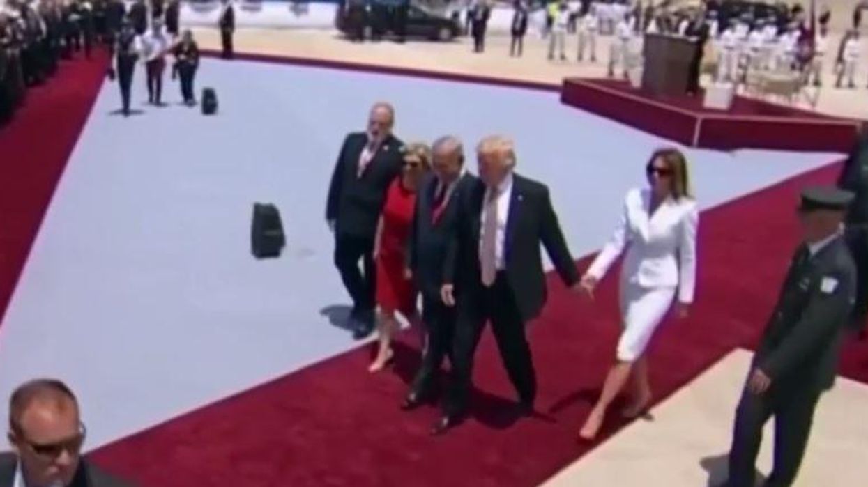 Melania Trump slapping Donald's hand away has become a glorious meme
