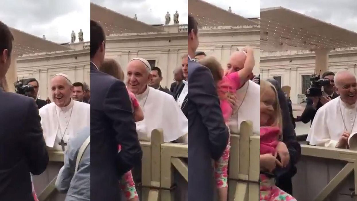 This kid just stole the Pope's hat