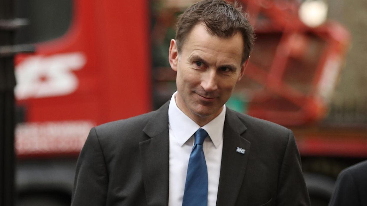 Jeremy Hunt got chased down the road by a reporter and it was incredibly awkward