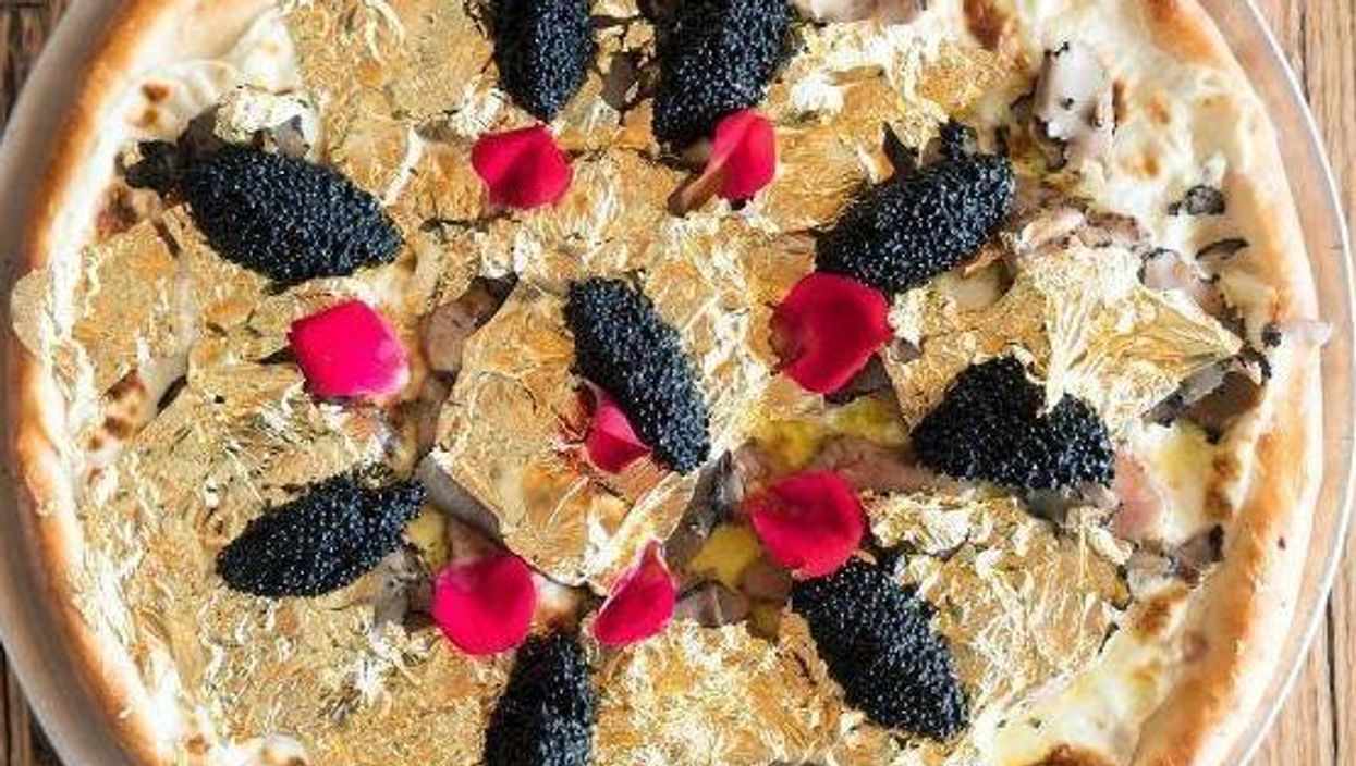 This restaurant is serving 24K gold pizza for $2000 because why not?