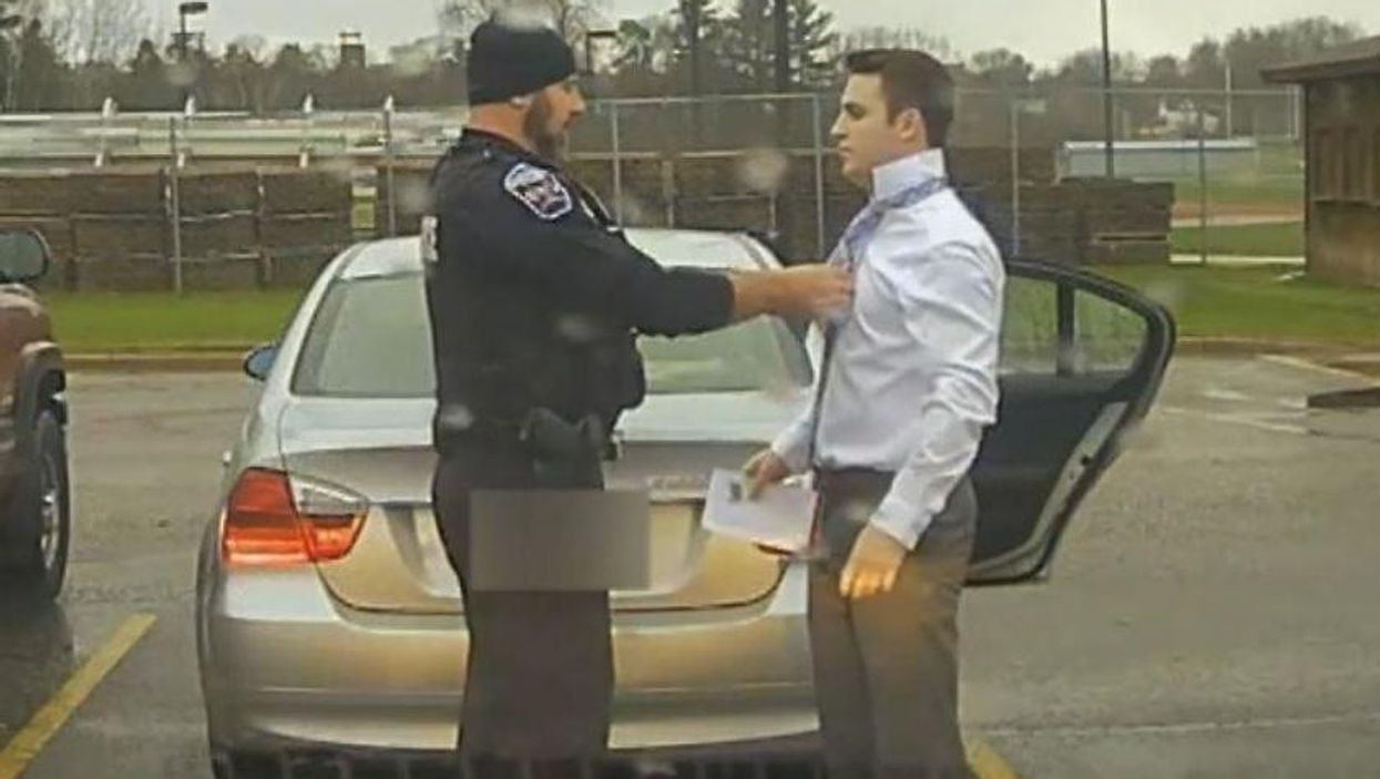 Police officer pulls over speeding student on his way to a presentation… Teaches him to tie a necktie properly