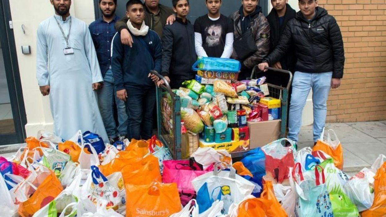 A mosque targeted by Britain First has donated 10 tonnes of food to the homeless for Christmas