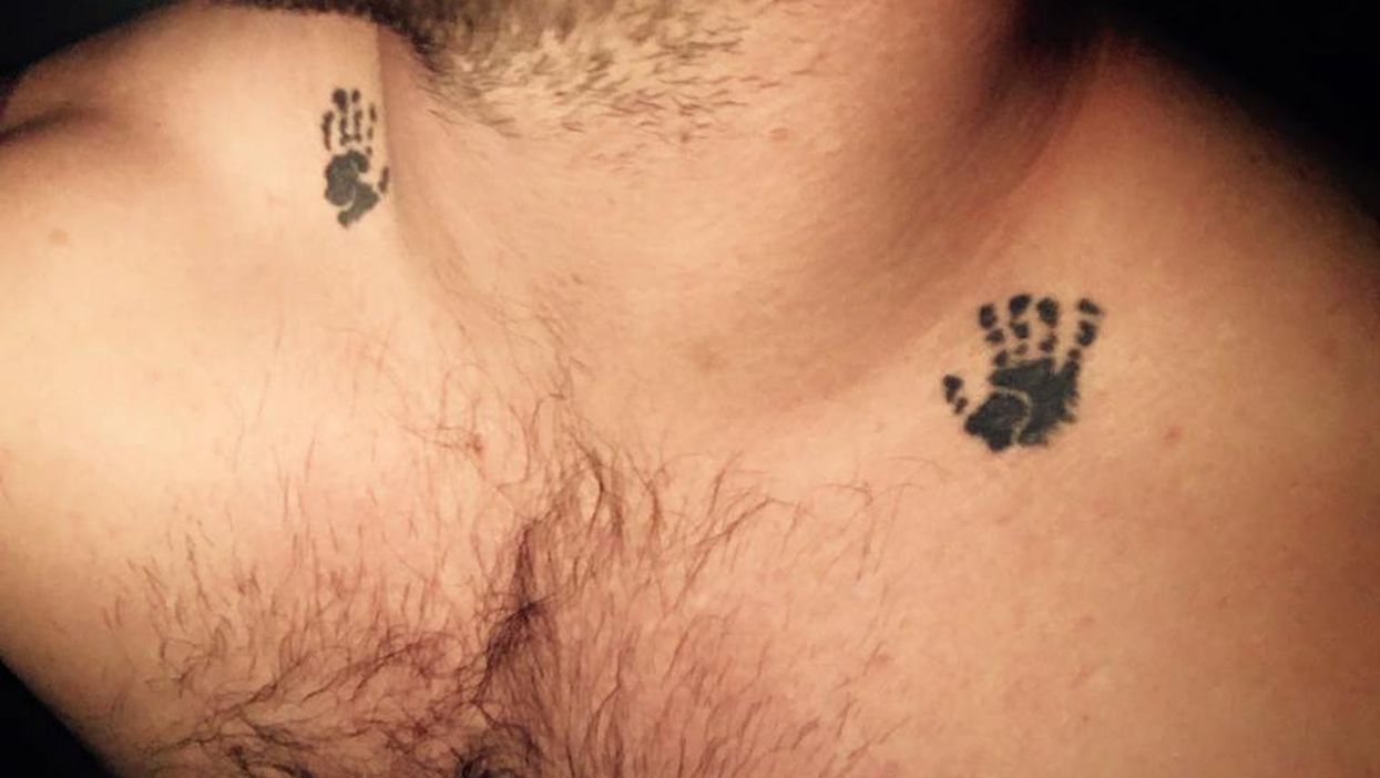 These tiny hand tattoos represent the son this father lost at birth