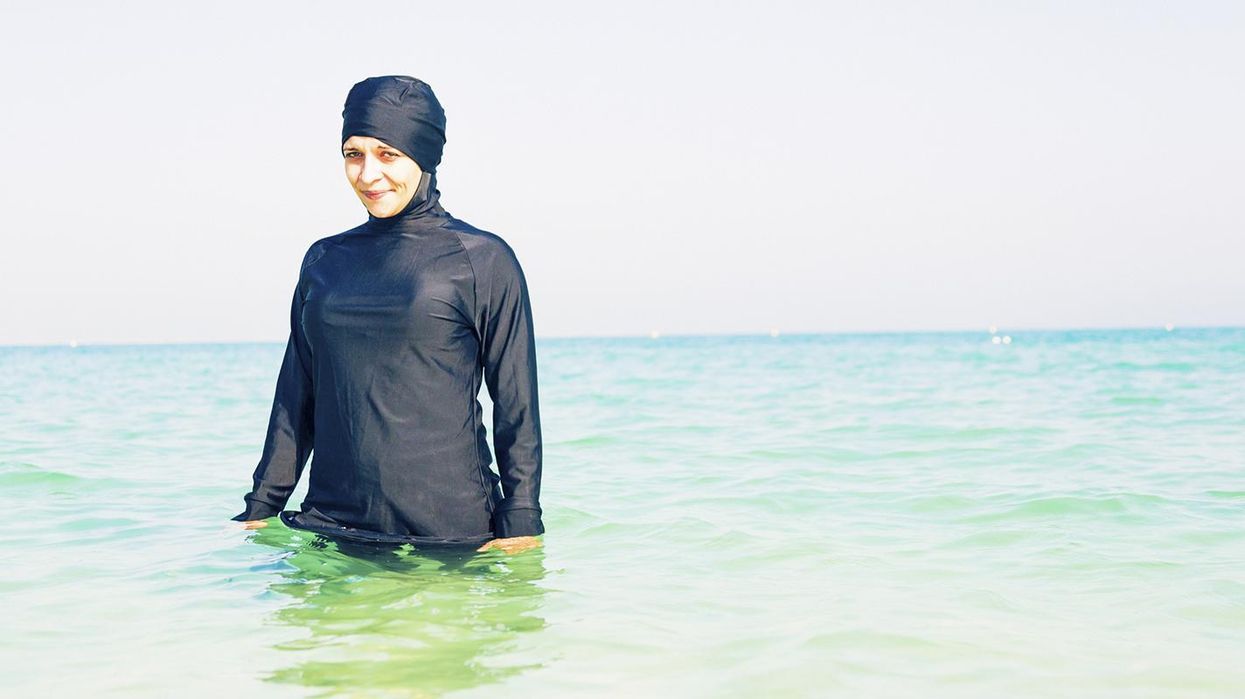 People are having a 'wear what you want' beach party protest outside the French embassy