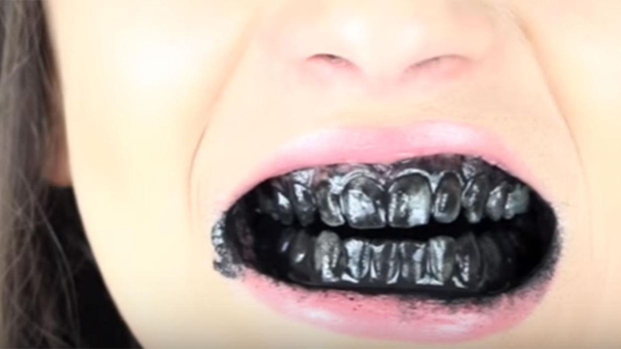 Here's why some people are brushing their teeth black - and why it's really not a good idea