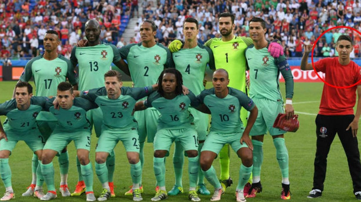 This kid photo-bombed the Portuguese football team before the Wales match