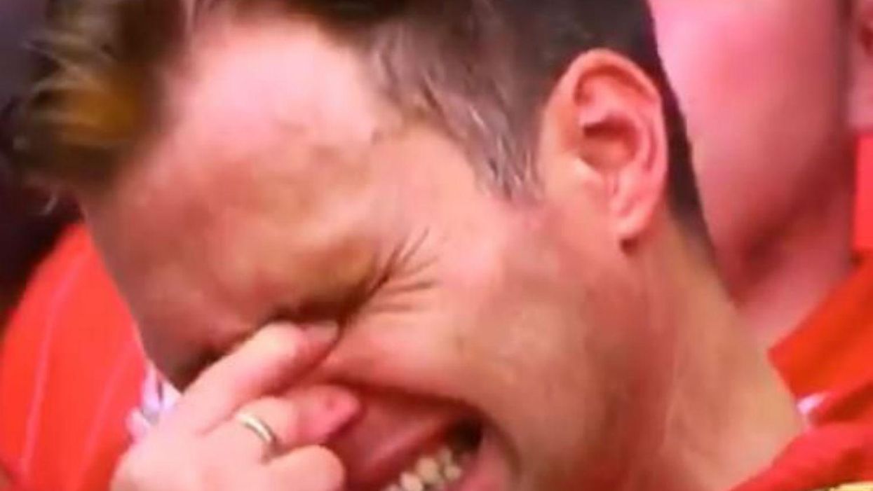 England scored a last minute winner and someone really needs to check on this crying Welsh fan