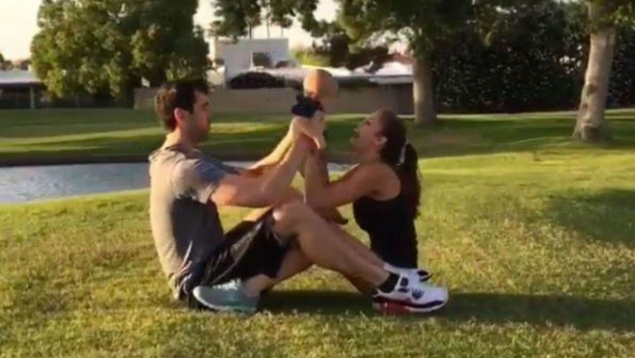 This woman is using her baby as an actual dumbbell