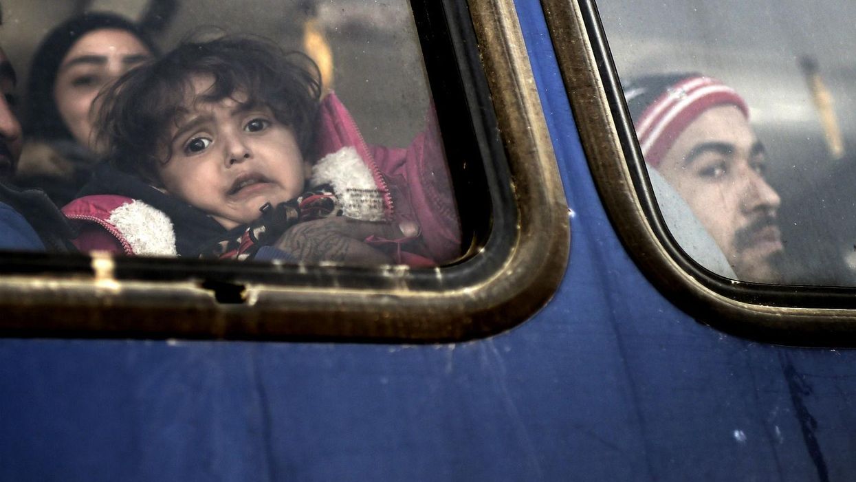 The first wave of refugees being deported back to Turkey, in pictures