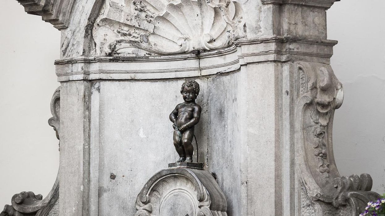 People in Brussels are sharing this image of a urinating statue to show what they think of terrorism