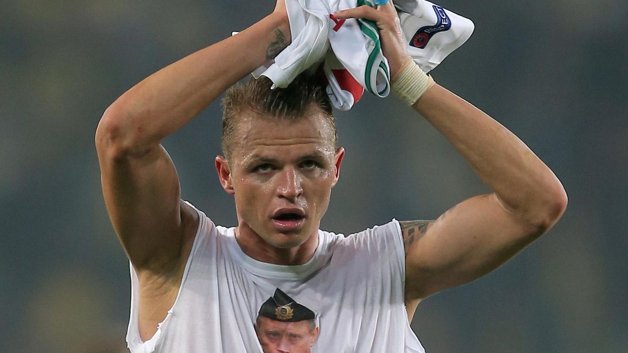 This Russian footballer decided to unveil a Vladimir Putin t-shirt... in Turkey