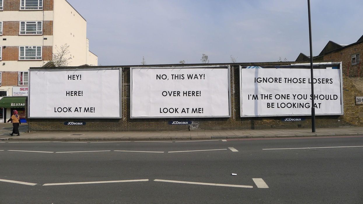 One 'mobster' in west London is trying to bring down capitalism with billboards