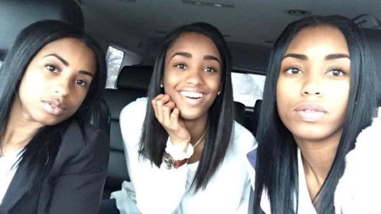 People are struggling to work out who is who in this picture of a mum and her twin daughters