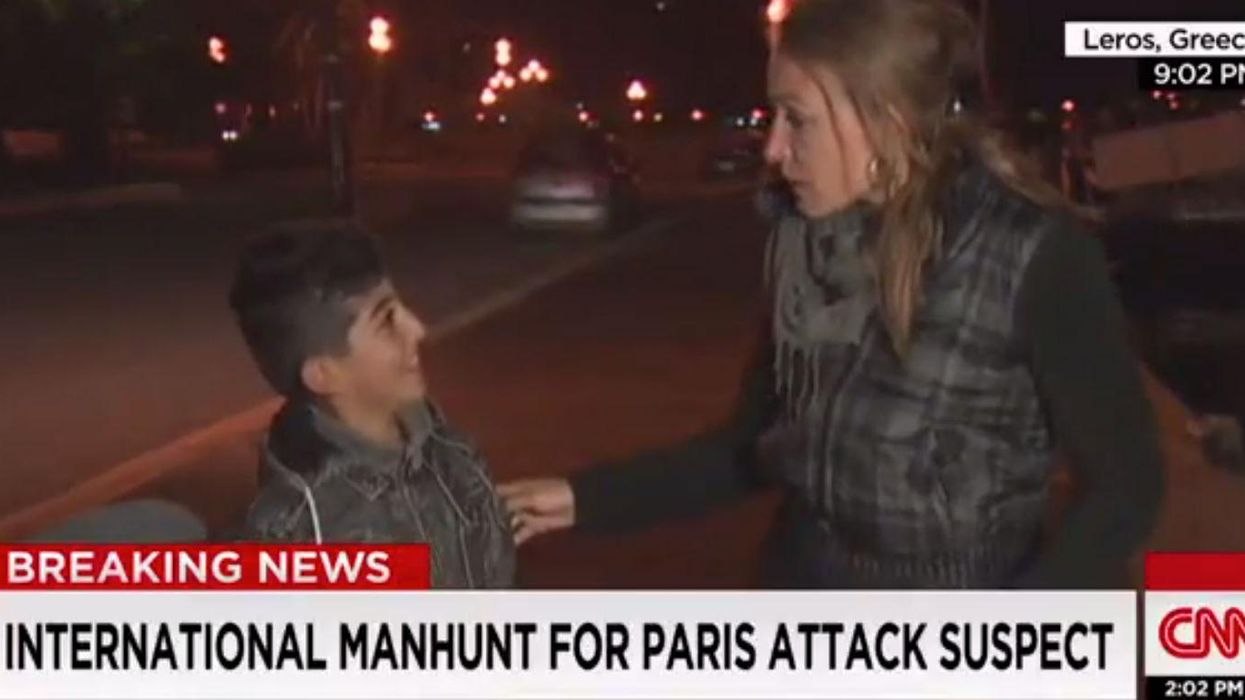 A CNN reporter and young refugee shared a very sweet moment on camera