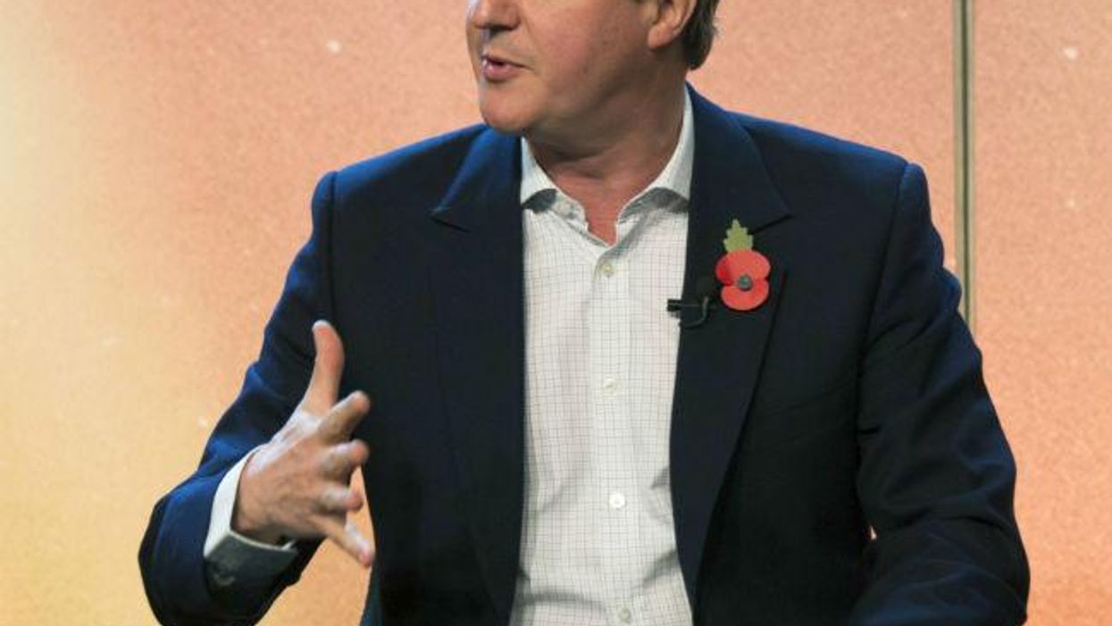 Why did Downing Street Photoshop a picture of a poppy on to David Cameron?