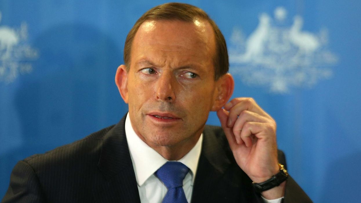 A 'shirtless, dancing' Tony Abbott apparently held a massive party after being ousted as PM where a marble table was smashed to pieces