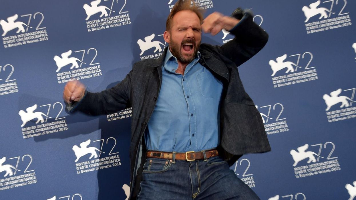 Ralph Fiennes started dancing in front of photographers because why not