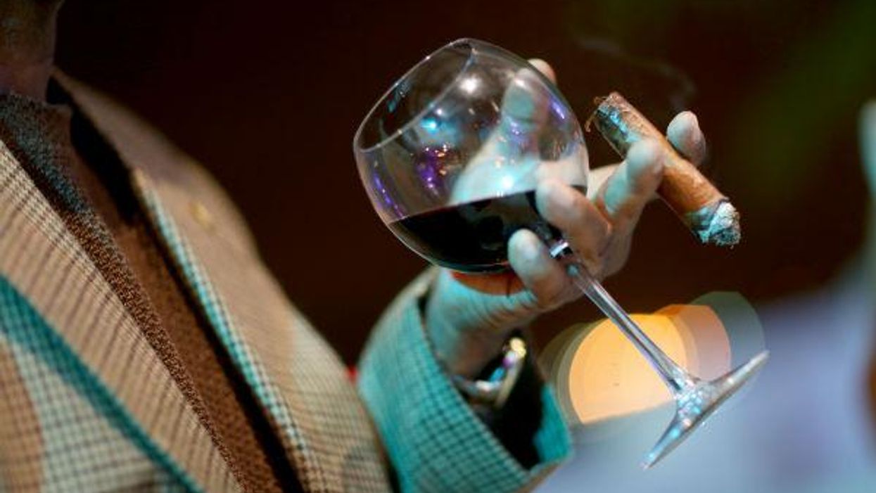 Breaking: you've been holding your wine glass all wrong