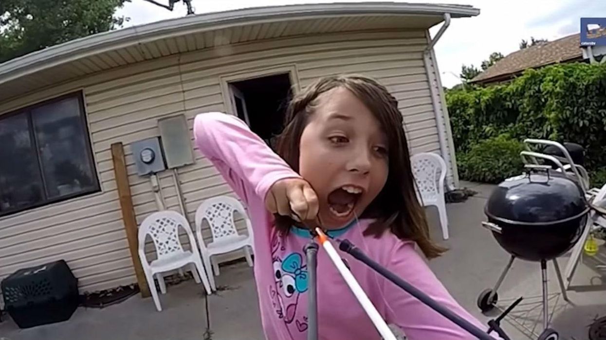Badass 11-year-old girl rips her baby tooth out with a crossbow