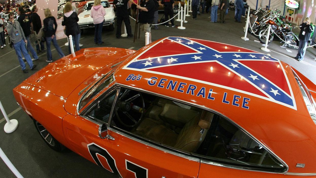 One of the world's top golfers is going to paint over the Confederate flag from the actual car from The Dukes of Hazzard. Really
