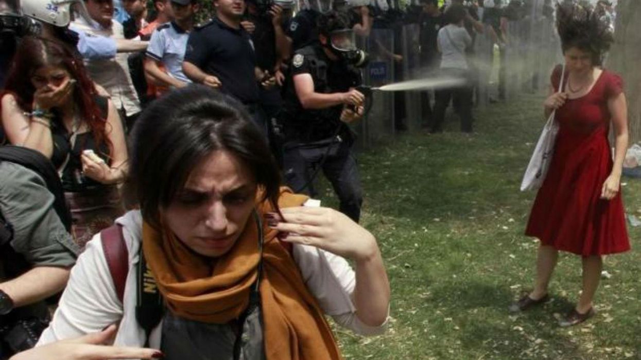The Turkish police officer who teargassed the "lady in red" has been given the most apt punishment