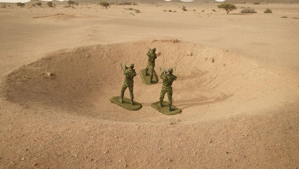 This artist photographed real life soldiers posing as toys to draw attention to a conflict in Africa