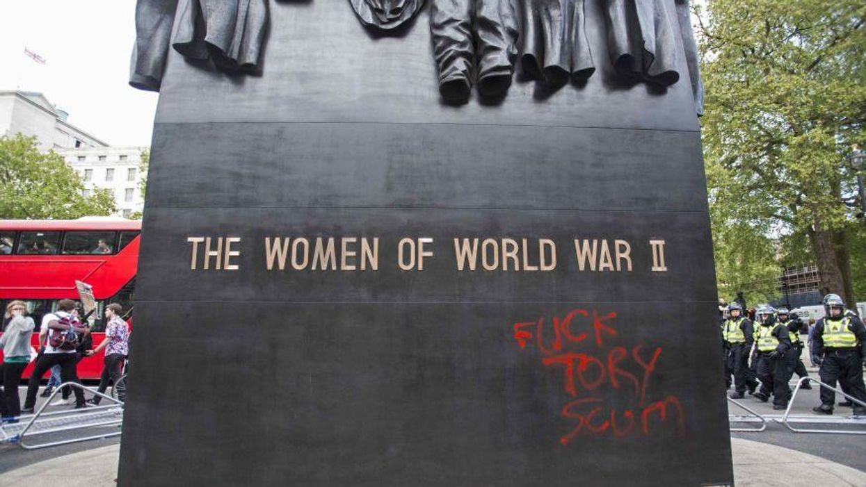 Women of World War II monument vandalised amid anti-austerity protests