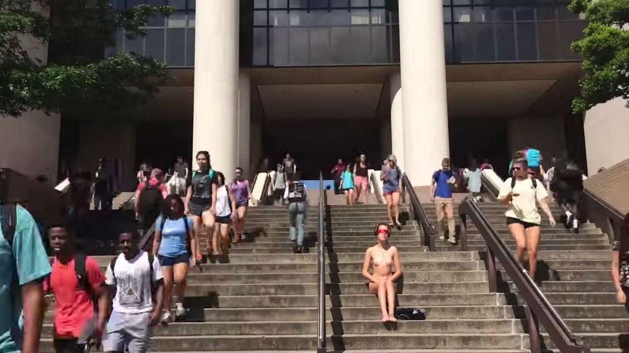 Why this student chose to sit nearly naked on her university campus