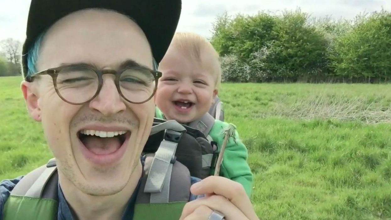 A baby seeing a dandelion for the first time is your daily dose of cuteness