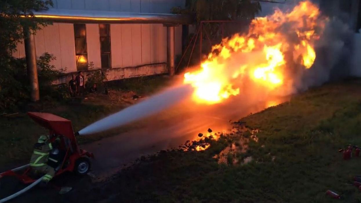 Here's what happens when a flamethrower goes up against a giant hose
